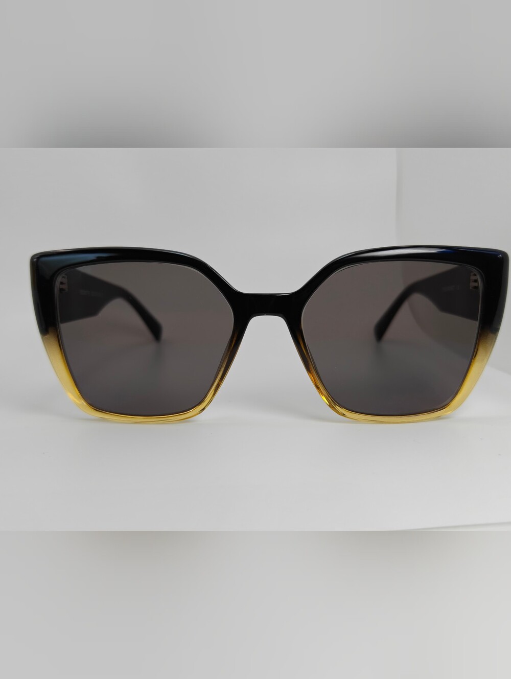 Pierrette. Women's Black to Gold Gradient Cat-Eye Sunglasses.